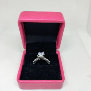 luminous embrace brilliant center stone with twisted band womens ring