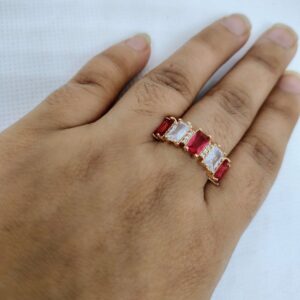 vibrant gold ring adorned with colorful gemstones